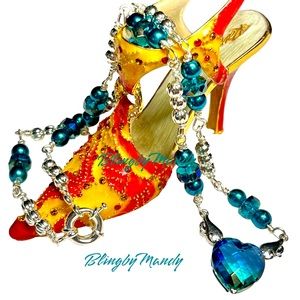 Beautiful beaded necklace -bi coloured heart in sterling